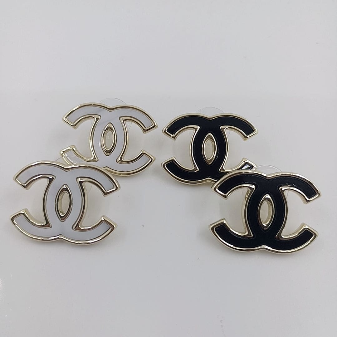 Chanel Black & White Earrings - 18K Yellow Gold