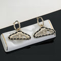 Chanel Coat Hanger Earrings - 18K Yellow Gold