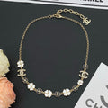 Chanel Black & White Camellia Necklace