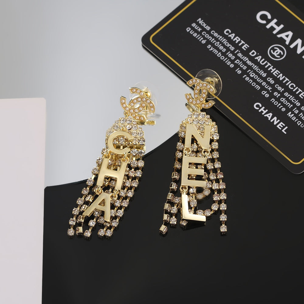 Chanel Letter Earrings - 18K Yellow Gold