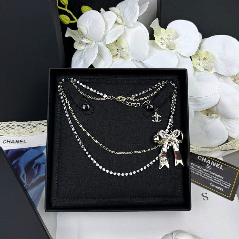 Chanel 25K Bow Tie Diamond Gold Necklace
