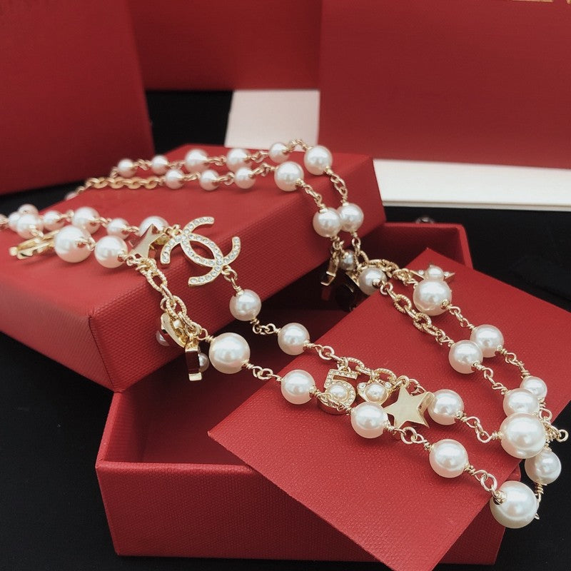 Chanel No.5 Star Long Pearl Necklace