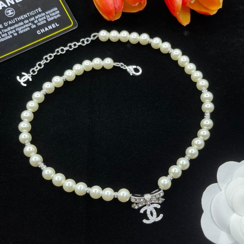 Chanel Bow Tie Pearl Necklace