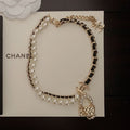 Chanel Pearl Leather Bag Pendant Necklace