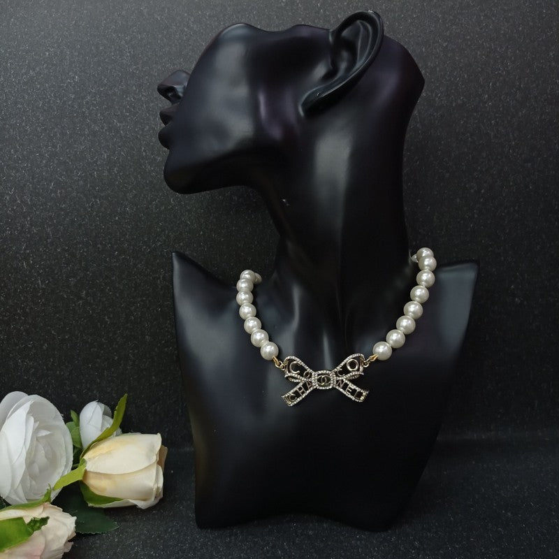 Chanel Bow Pearl Necklace