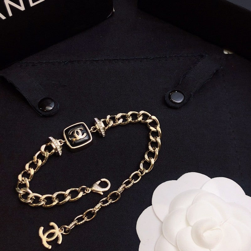 Chanel Black Logo Gold Chain Bracelet