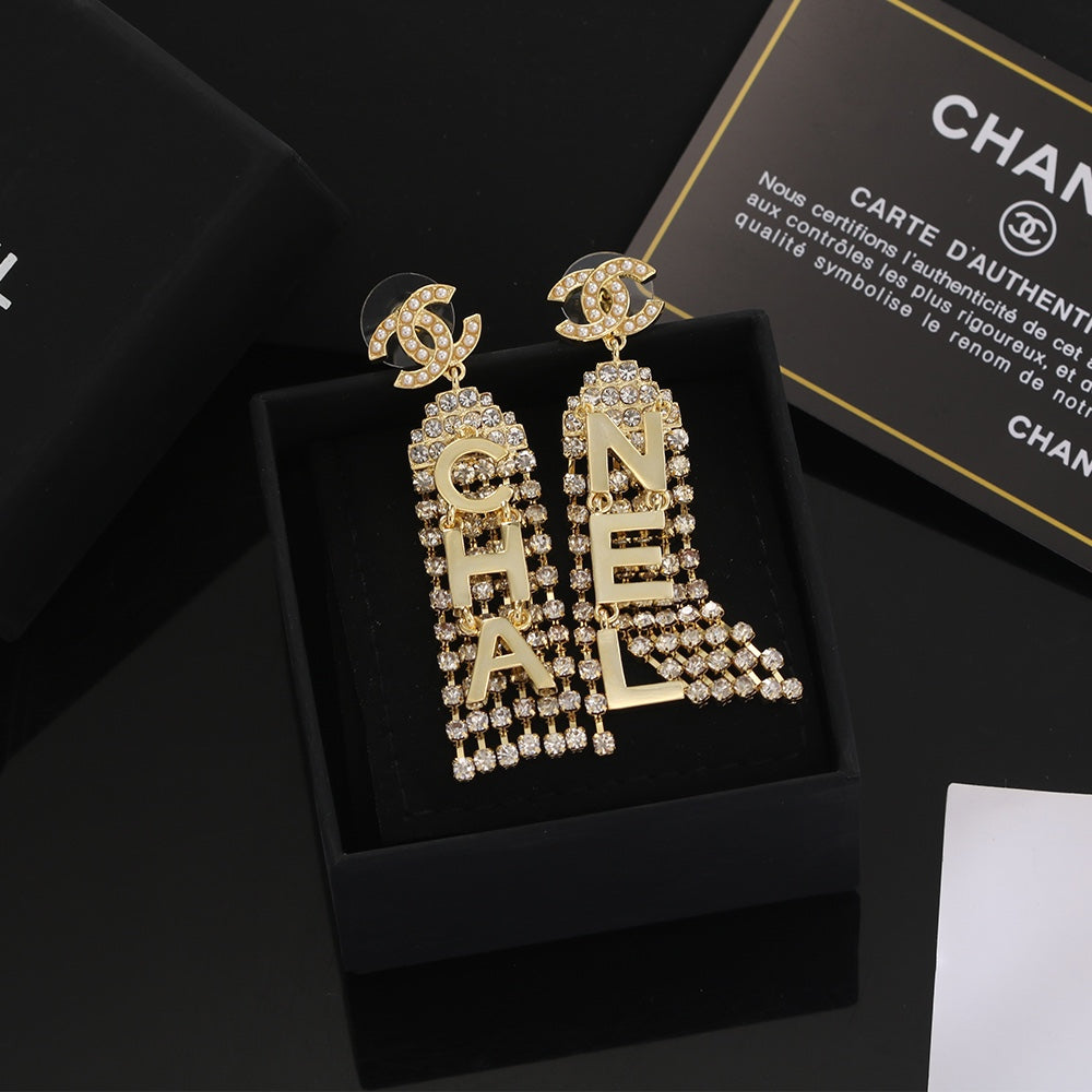 Chanel Letter Earrings - 18K Yellow Gold