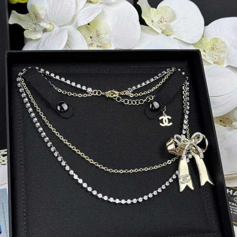 Chanel 25K Bow Tie Diamond Gold Necklace