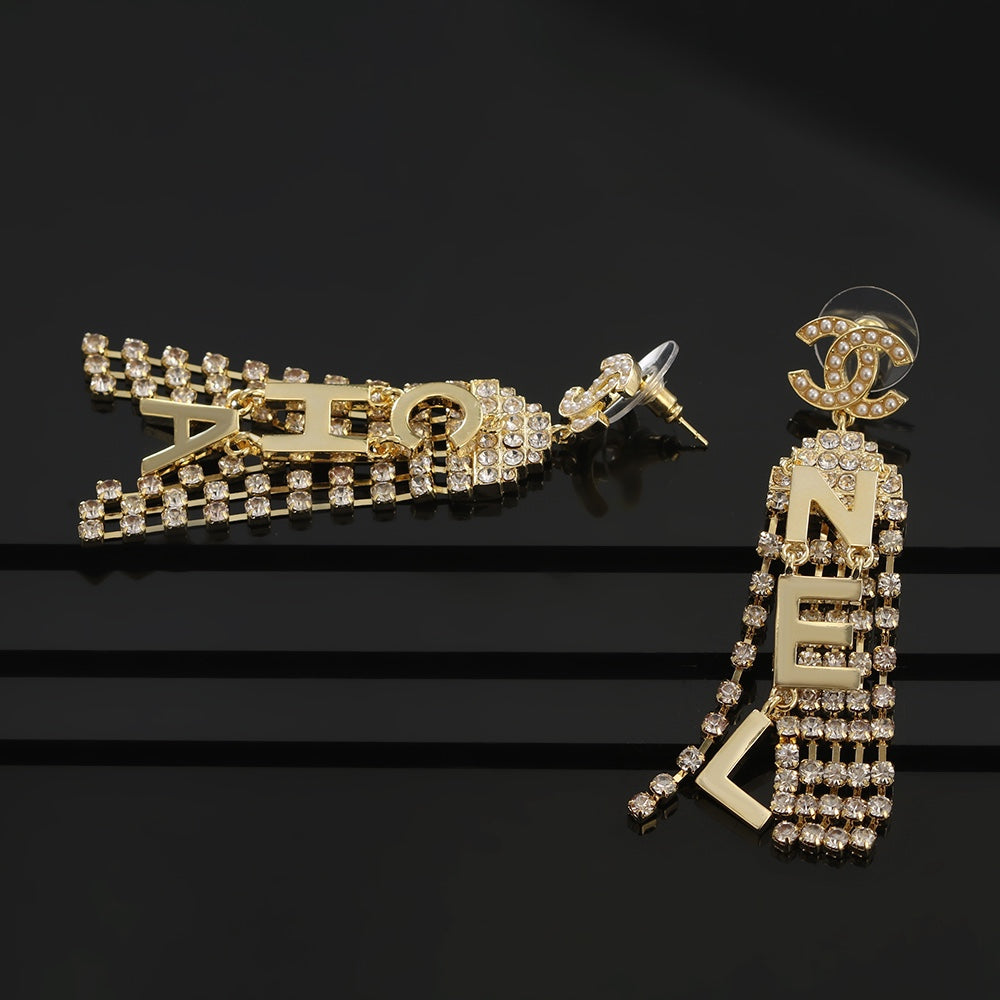 Chanel Letter Earrings - 18K Yellow Gold