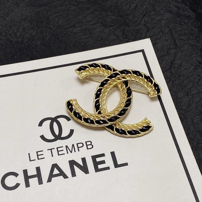Chanel Leather Gold Brooch