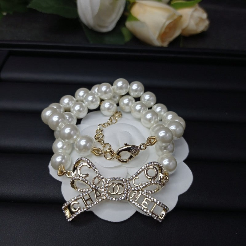 Chanel Bow Pearl Necklace