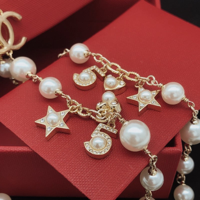 Chanel No.5 Star Long Pearl Necklace