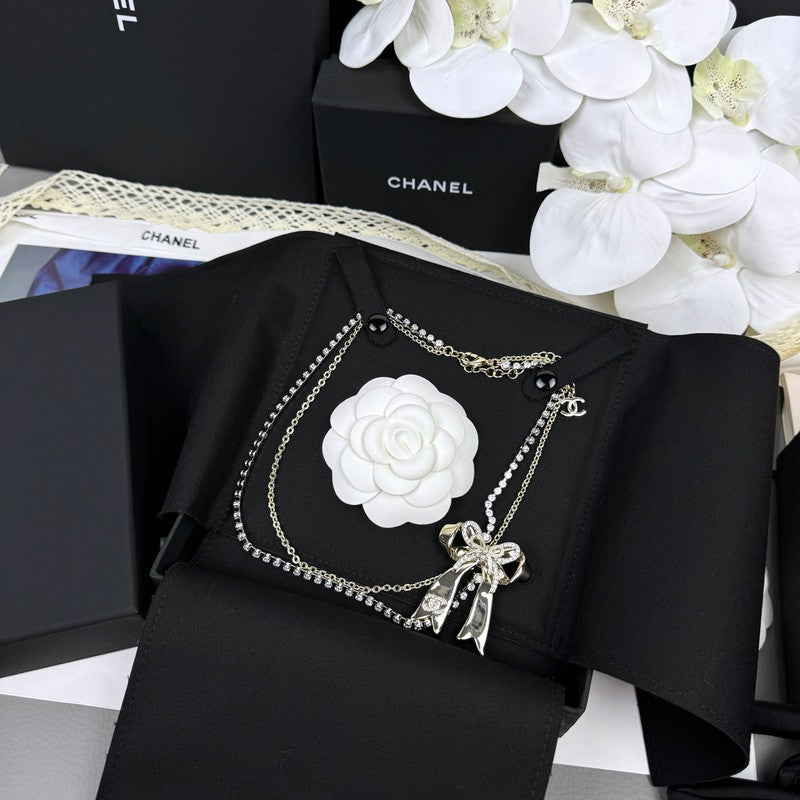 Chanel 25K Bow Tie Diamond Gold Necklace