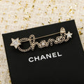 Chanel Leather Gold Brooch
