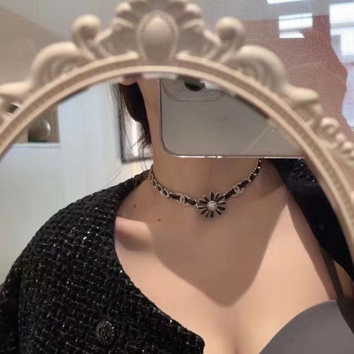 Chanel Black Daisy Necklace
