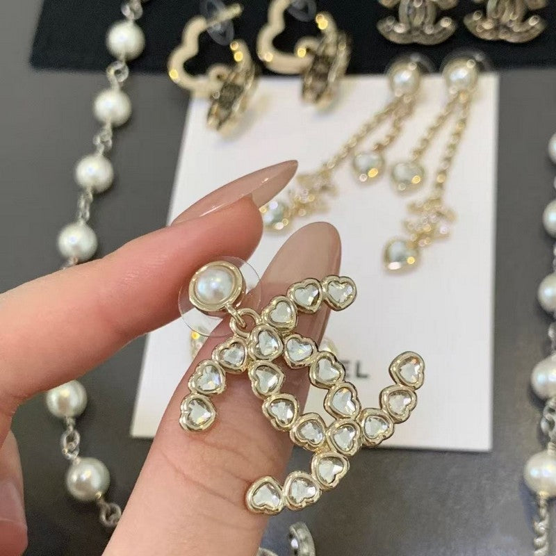 Chanel Pearl & Crystal Earrings - 18K Yellow Gold