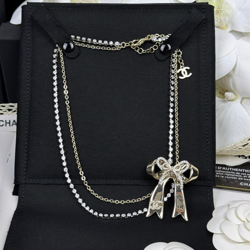 Chanel 25K Bow Tie Diamond Gold Necklace