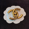 Chanel Paris Gold Brooch