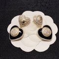 Chanel Black Heart Earrings - 18K Yellow Gold