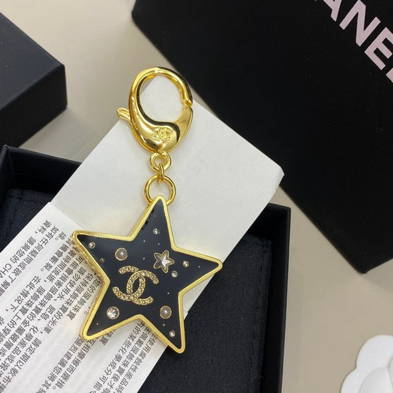 Chanel Black Gold Star Brooch