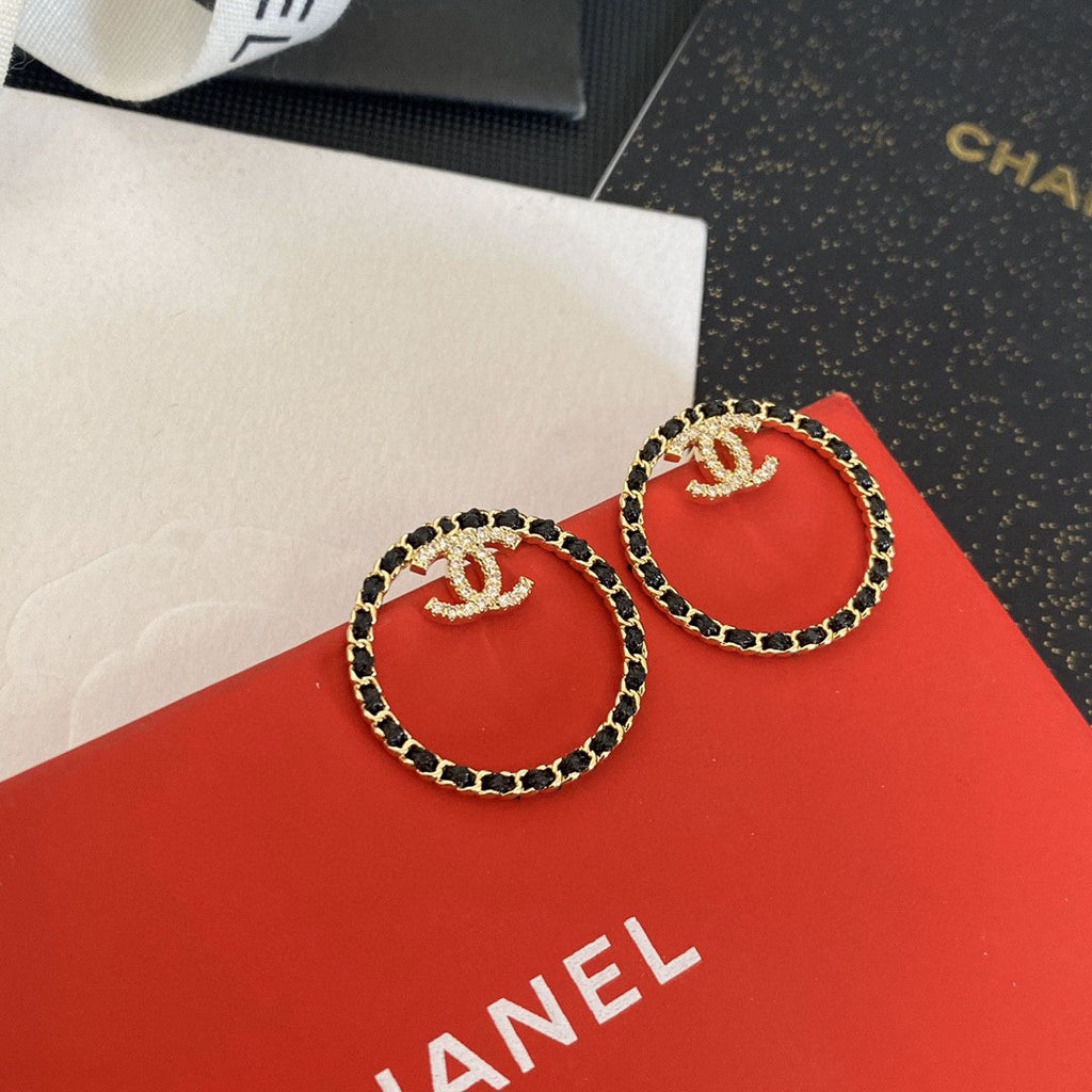 Chanel Black Leather Circle Earrings - 18K Yellow Gold