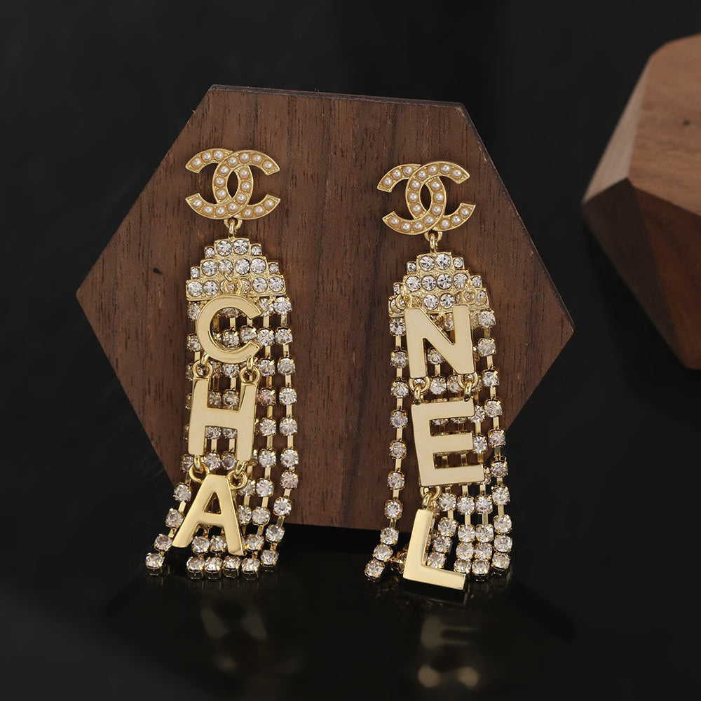 Chanel Letter Earrings - 18K Yellow Gold