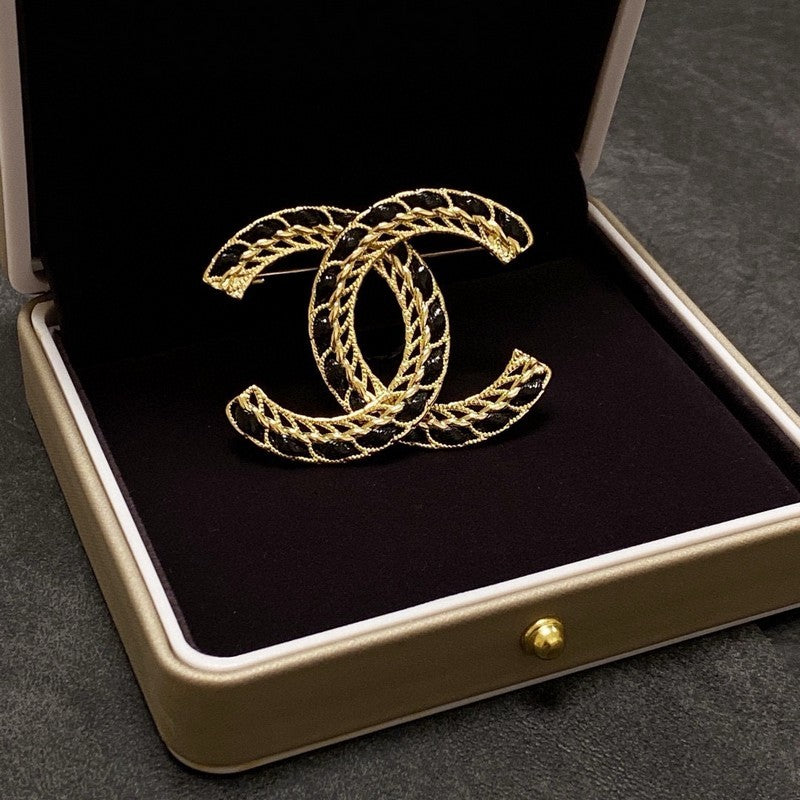 Chanel Leather Gold Brooch
