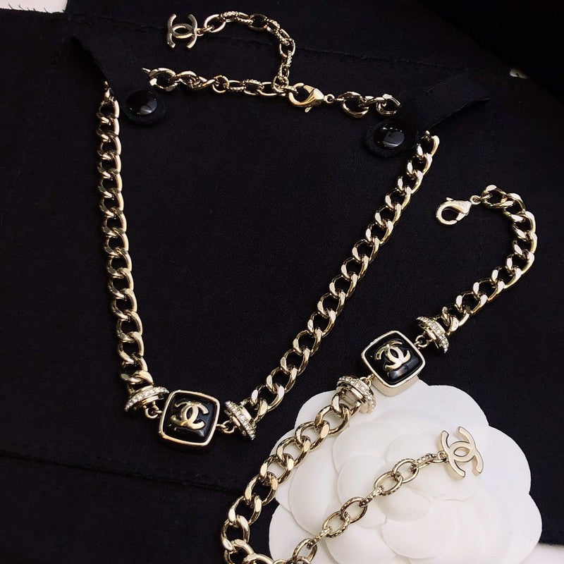Chanel Black Logo Gold Chain Necklace