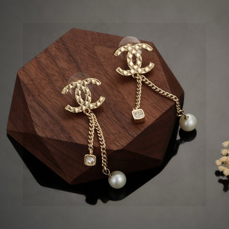 Chanel Long Pearl Pendant Earrings - 18K Yellow Gold