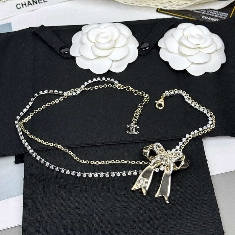 Chanel 25K Bow Tie Diamond Gold Necklace