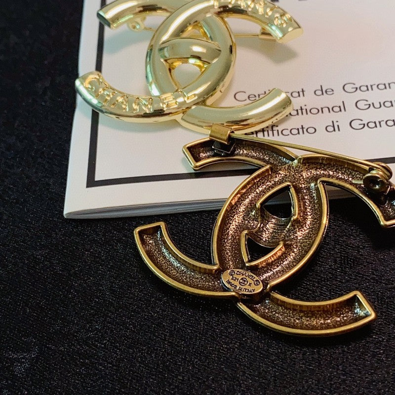 Chanel Paris Gold Brooch