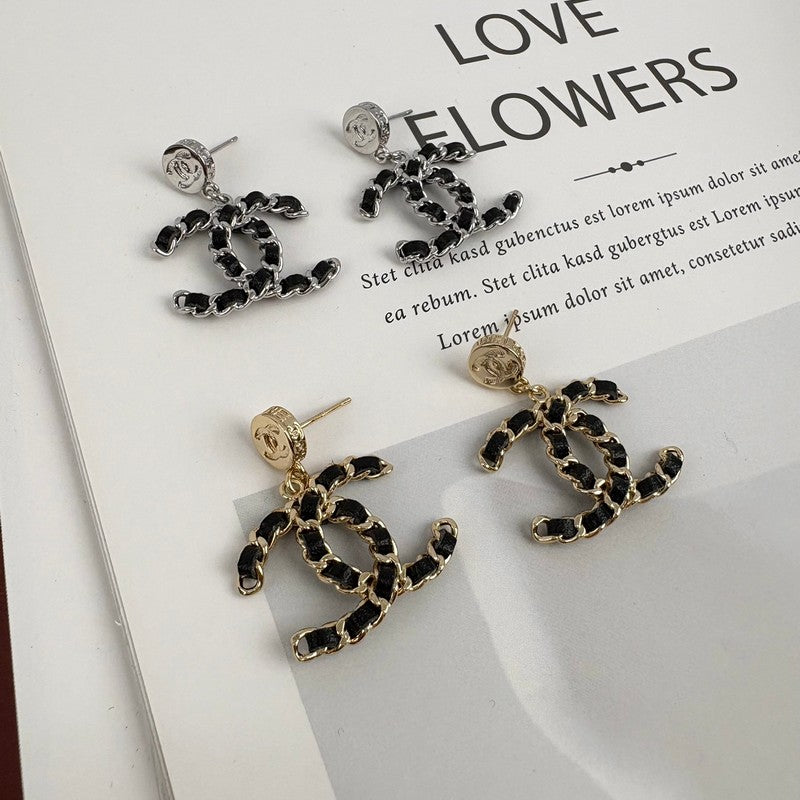 Chanel Leather Earrings - 18K Gold