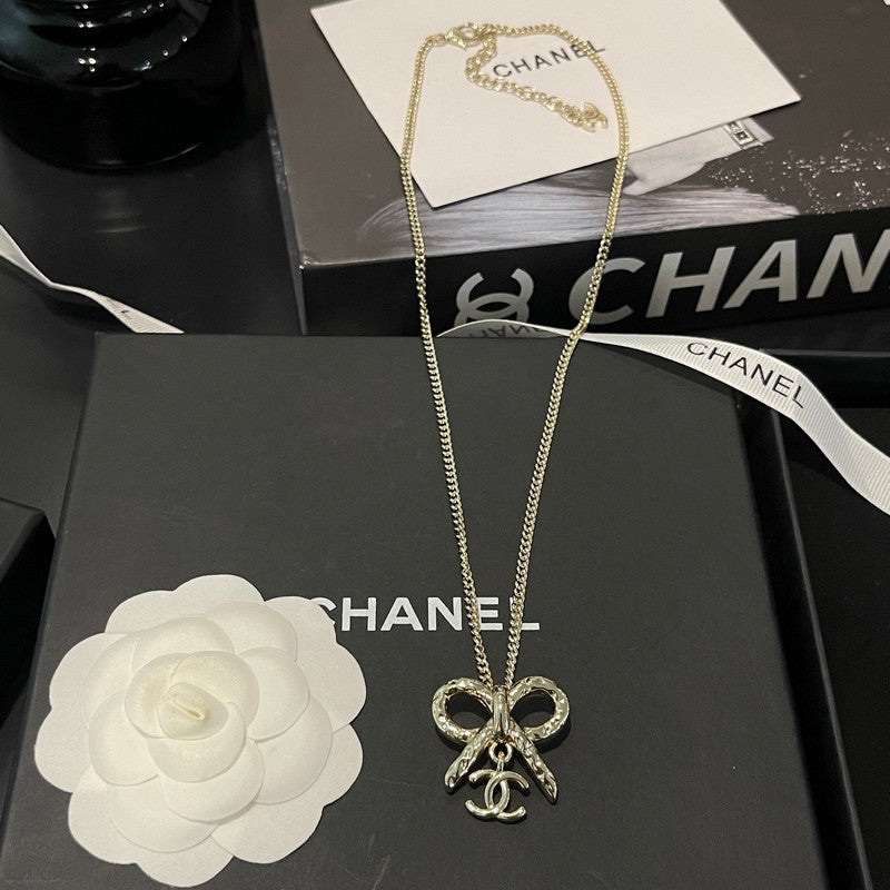 Chanel Gold Bow Tie Necklace
