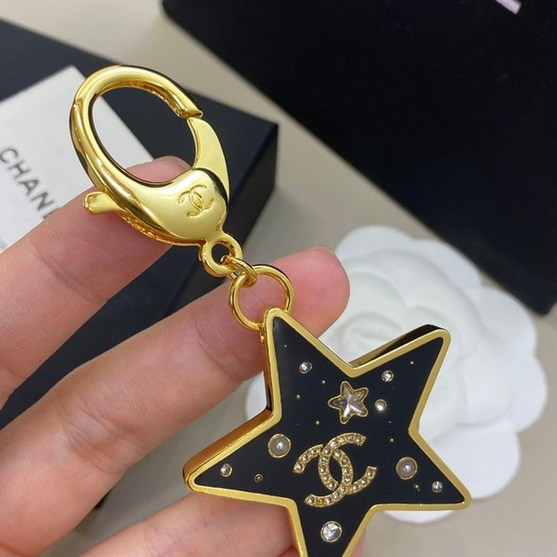 Chanel Black Gold Star Brooch