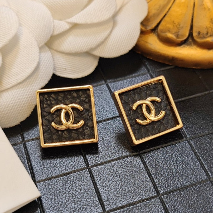 Chanel Black Square Earrings - 18K Yellow Gold