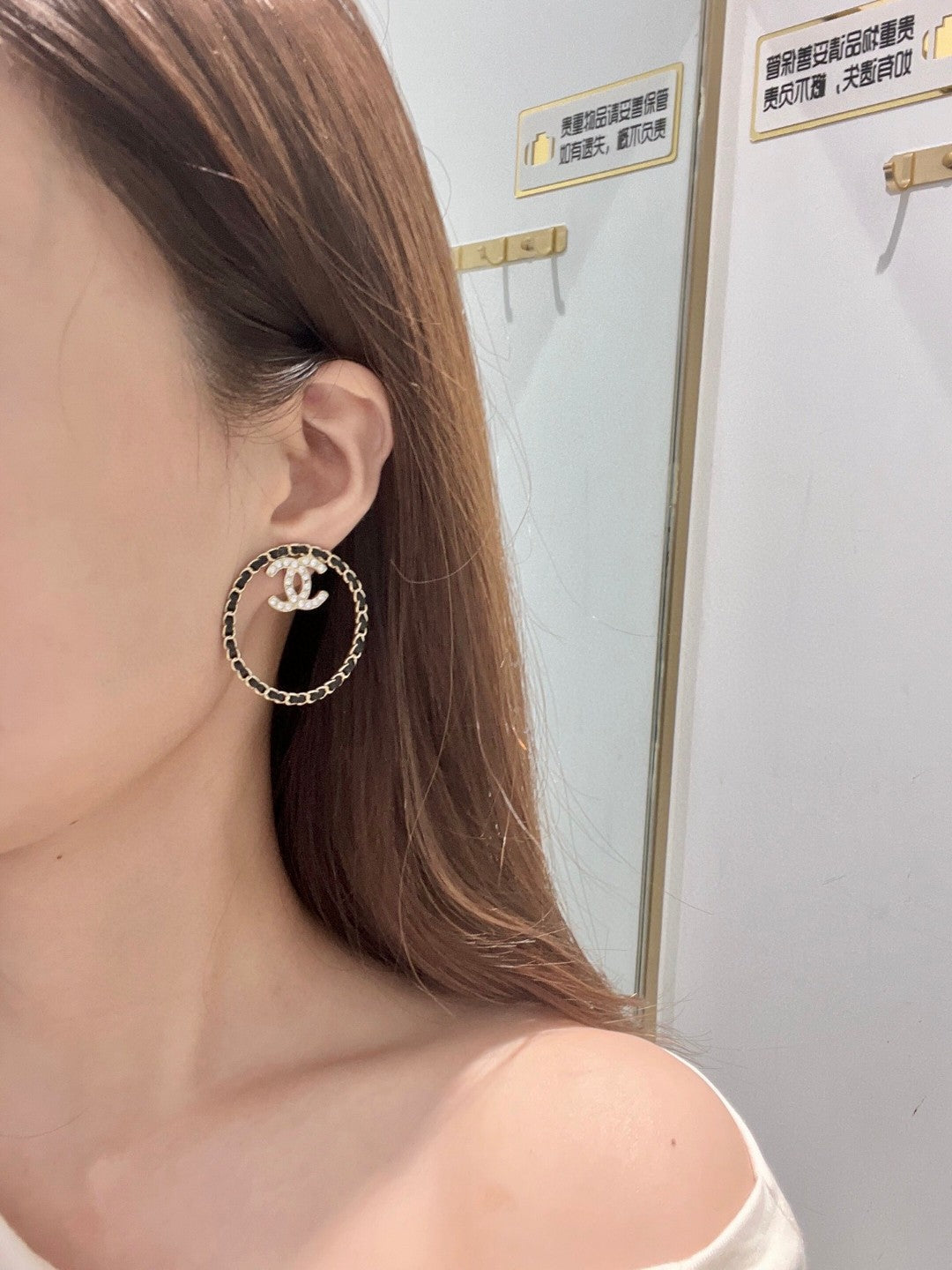 Chanel Black Leather Circle Earrings - 18K Yellow Gold