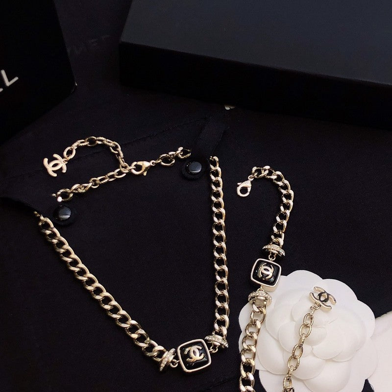 Chanel Black Logo Gold Chain Necklace
