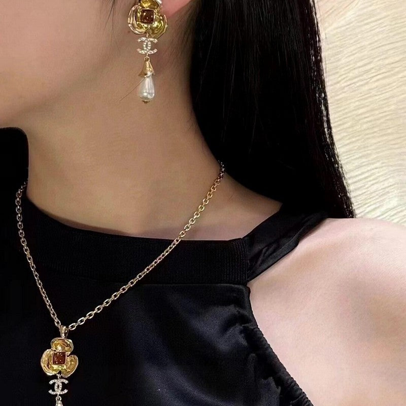 Chanel Camellia Pearl Earrings - 18K Yellow Gold