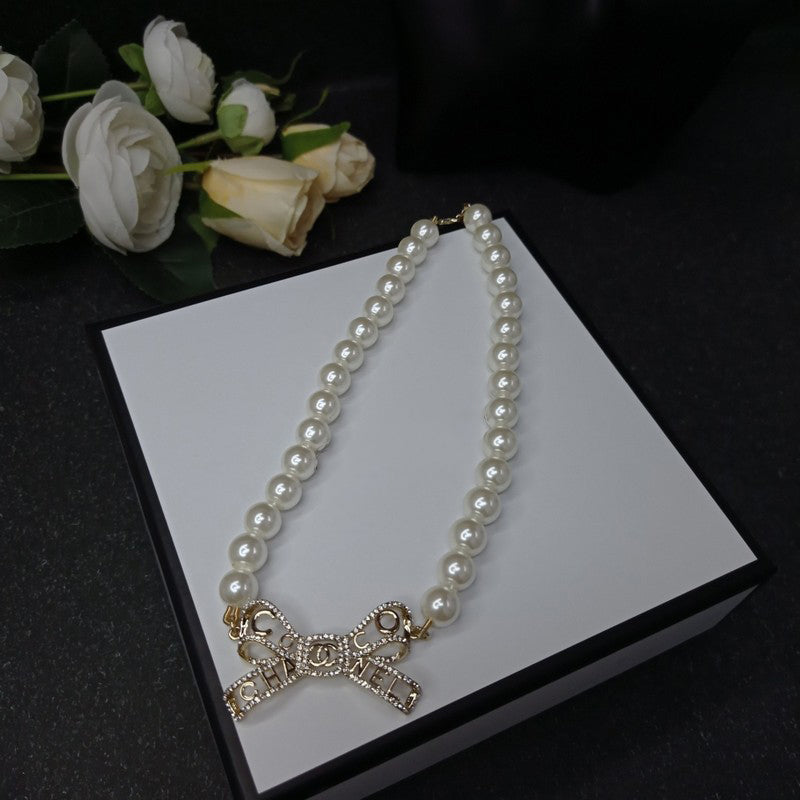 Chanel Bow Pearl Necklace
