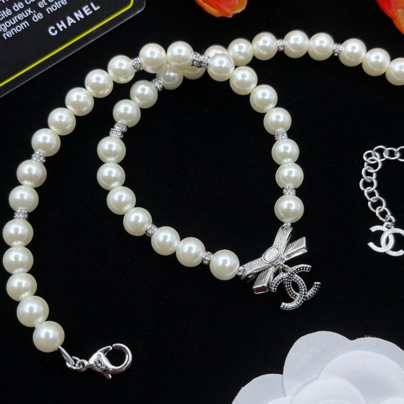 Chanel Bow Tie Pearl Necklace