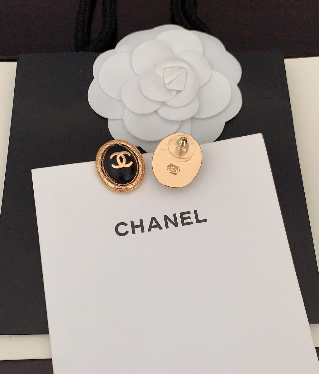 Chanel Oval Leather Earrings - 18K Yellow Gold