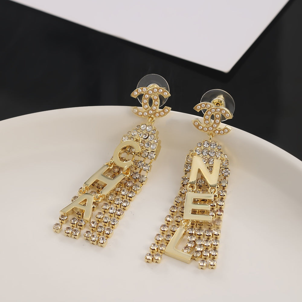 Chanel Letter Earrings - 18K Yellow Gold