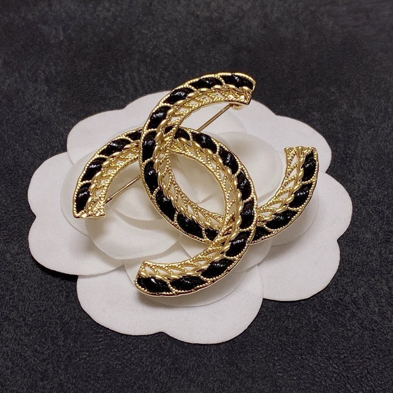 Chanel Leather Gold Brooch