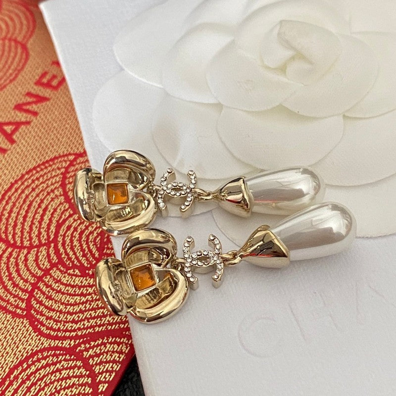 Chanel Camellia Pearl Earrings - 18K Yellow Gold