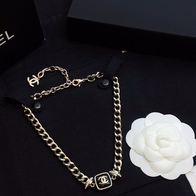 Chanel Black Logo Gold Chain Necklace