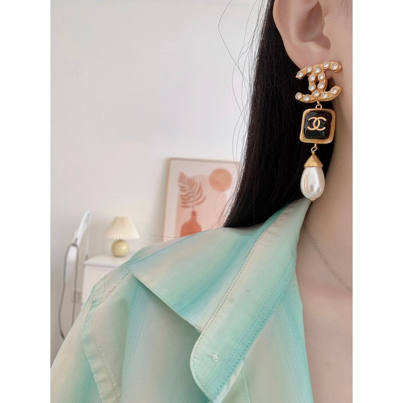 Chanel Long Pearl Pendant Earrings - 18K Yellow Gold