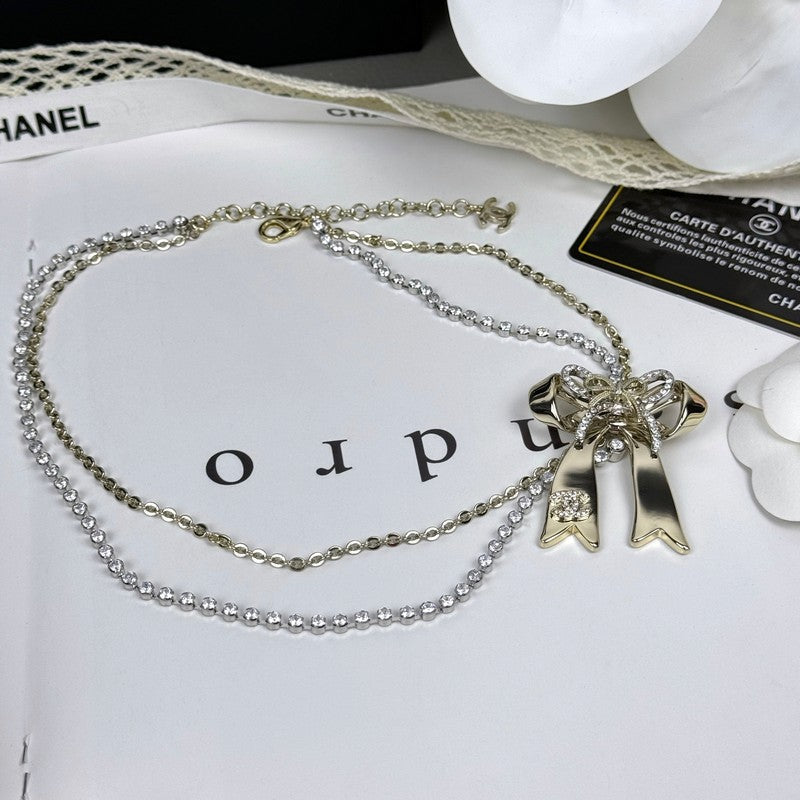 Chanel 25K Bow Tie Diamond Gold Necklace