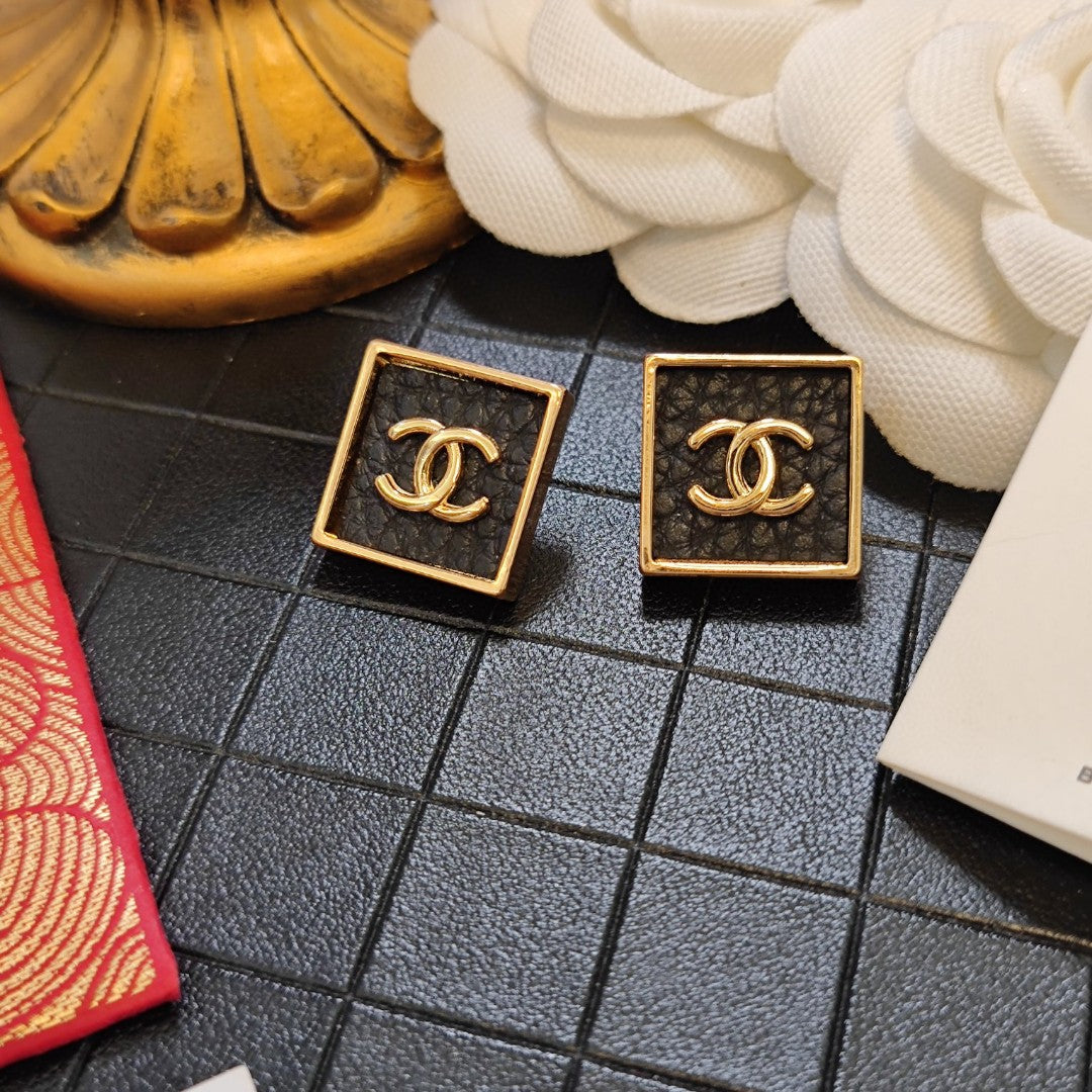 Chanel Black Square Earrings - 18K Yellow Gold